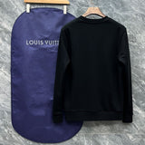 Side profile of Louis Vuitton luxury clothing with signature branding