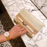 Side view of tailored structured handbag