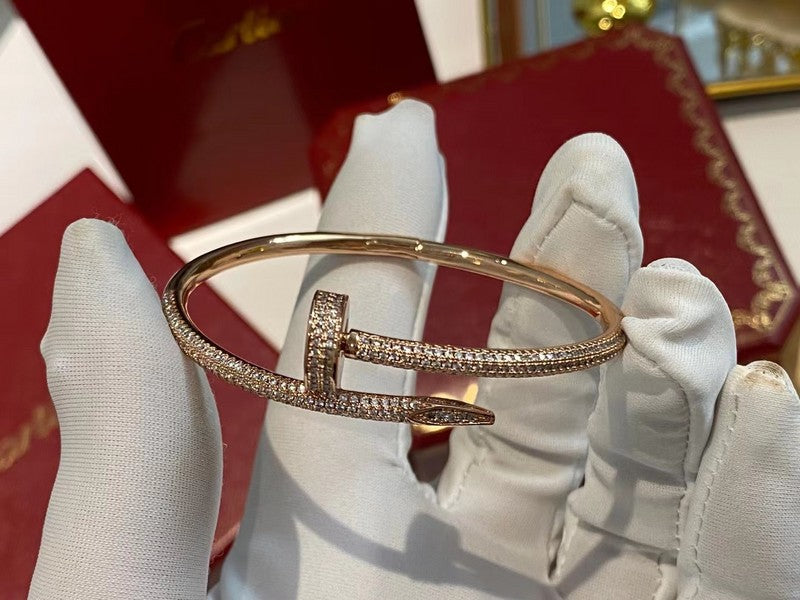 Close-up detail view of Cartier unisex jewelry piece