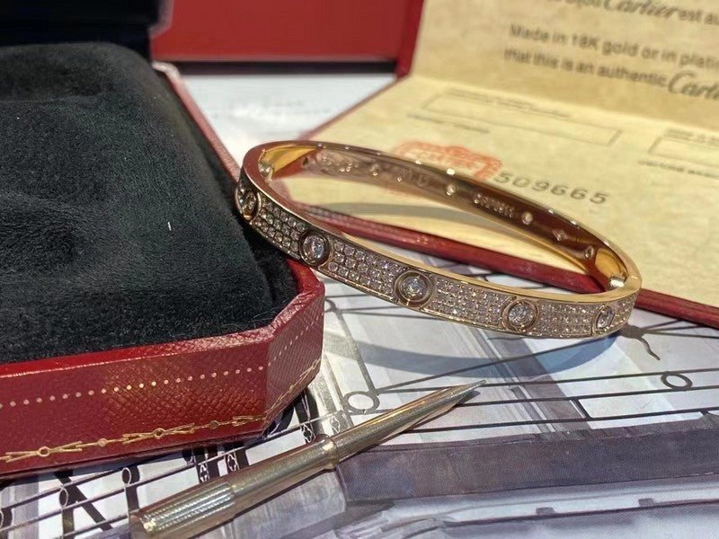 Side view of Cartier unisex jewelry piece