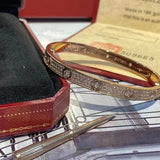 Side view of Cartier unisex jewelry piece