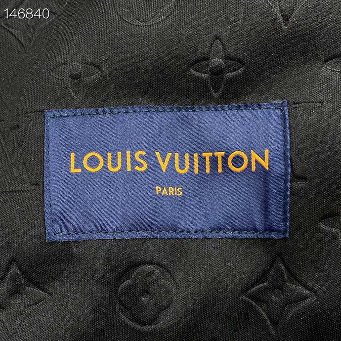 Back view of Louis Vuitton luxury clothing with tailored silhouette