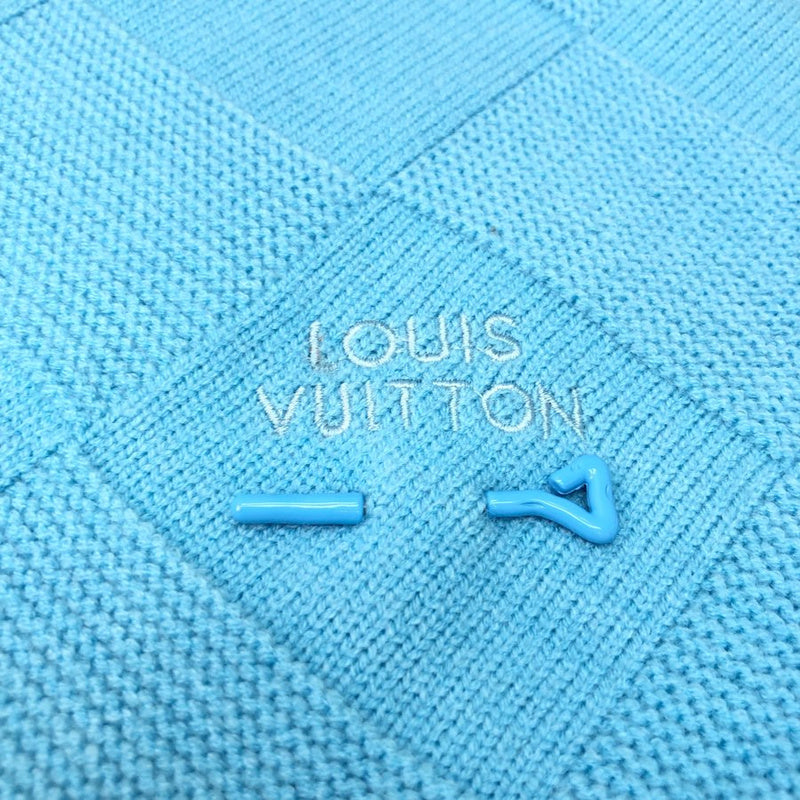 Full styled look of Louis Vuitton luxury clothing with monogram-inspired silhouette