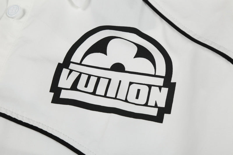Close-up detail shot of Louis Vuitton luxury clothing with logo-detail design