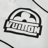 Close-up detail shot of Louis Vuitton luxury clothing with logo-detail design
