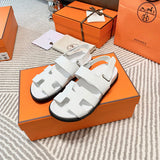 Hermes sandals Style 213 - close-up of iconic logo design