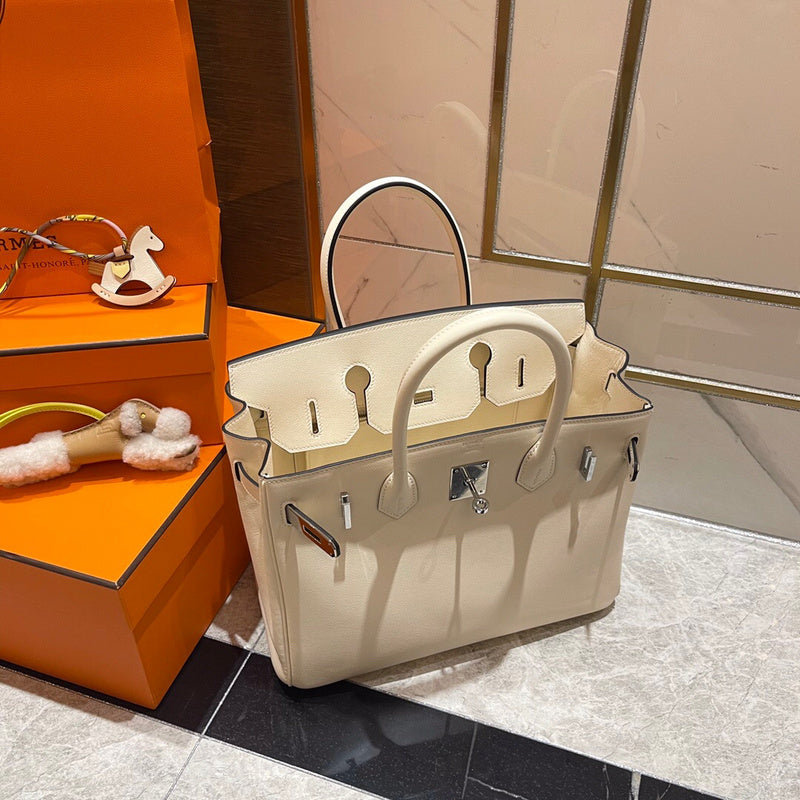 Side view of refined structured handbag