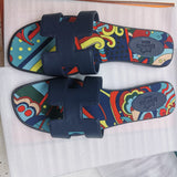 Hermes sandals Style 023 - angled studio shot