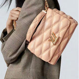  Polished carryall bag carried on shoulder