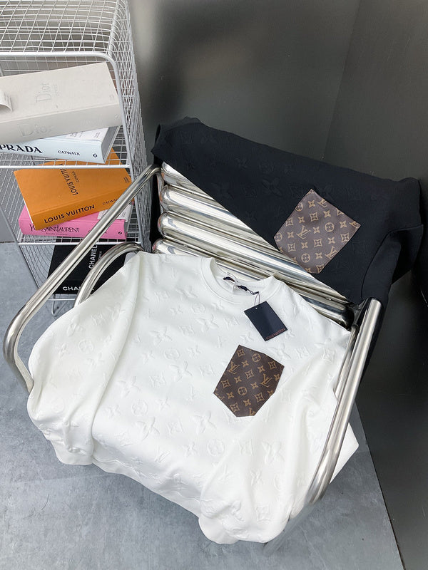 Side profile of Louis Vuitton luxury clothing with label-forward styling