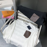 Side profile of Louis Vuitton luxury clothing with label-forward styling
