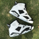 Side profile of Nike two-tone sneakers sleek tonal finish