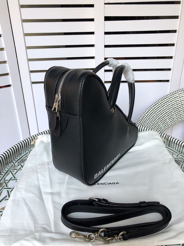 Handle and strap detail of refined signature women's handbag – women's luxury handbag
