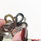 Close-up detail view of Van Cleef & Arpels unisex jewelry piece