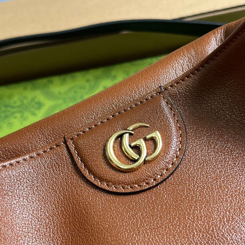 Styled lifestyle shot of structured signature women's handbag – women's everyday handbag