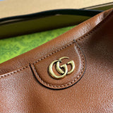 Styled lifestyle shot of structured signature women's handbag – women's everyday handbag