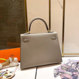 Side view of streamlined structured handbag