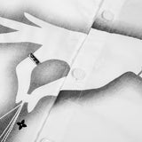 Close-up detail shot of Louis Vuitton luxury clothing with monogram-inspired silhouette