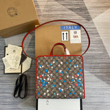 Side profile of signature statement women's handbag – women's luxury handbag