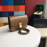 Side profile of statement modern women's handbag – women's luxury handbag