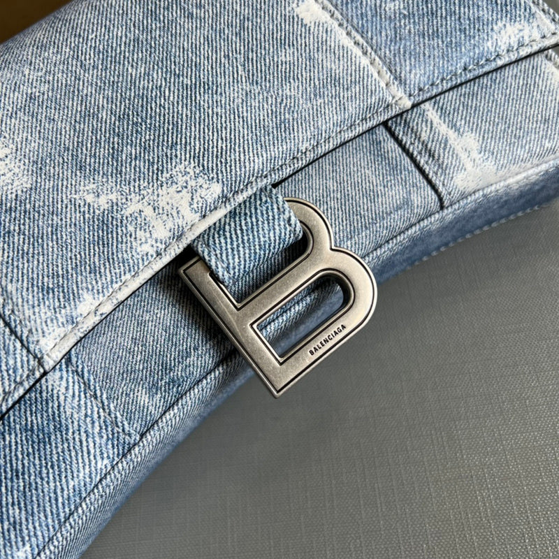 Side profile of signature refined women's handbag – women's luxury accessory