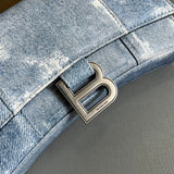 Side profile of signature refined women's handbag – women's luxury accessory