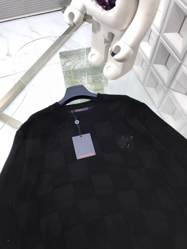 Front view of Louis Vuitton luxury clothing with signature branding