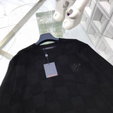 Front view of Louis Vuitton luxury clothing with signature branding