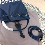 Styled lifestyle shot of elevated polished women's handbag – women's luxury handbag
