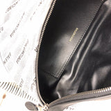 Side profile of statement signature women's handbag – women's premium purse
