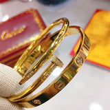Close-up detail view of Cartier unisex jewelry piece