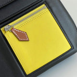 Side view of clean-lined structured handbag
