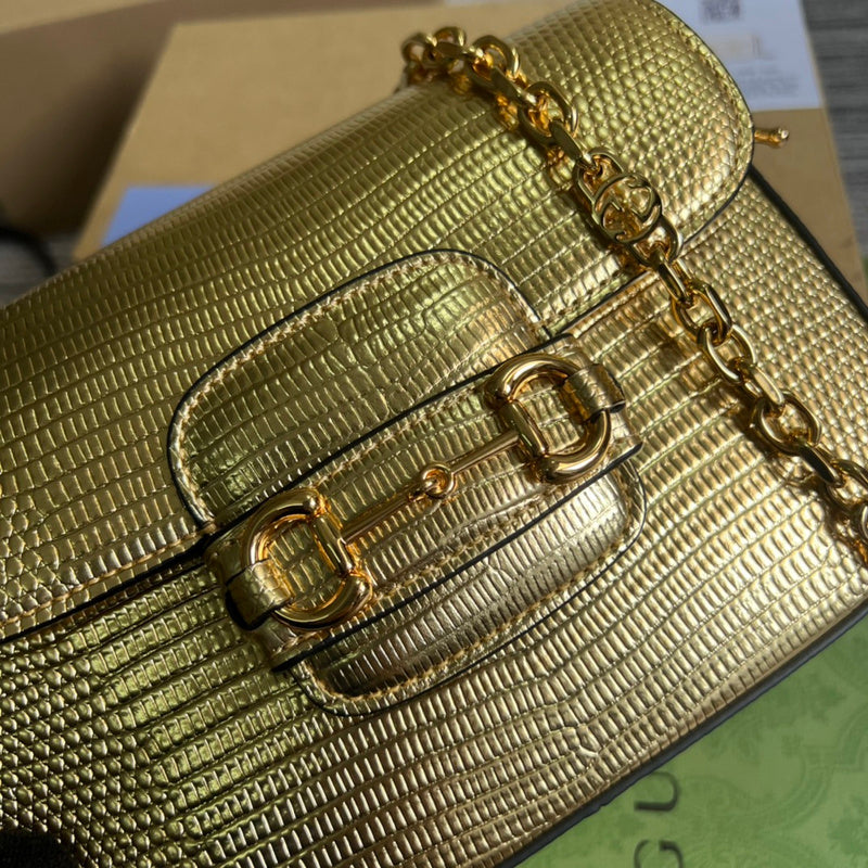Styled lifestyle shot of refined structured women's handbag – women's statement bag