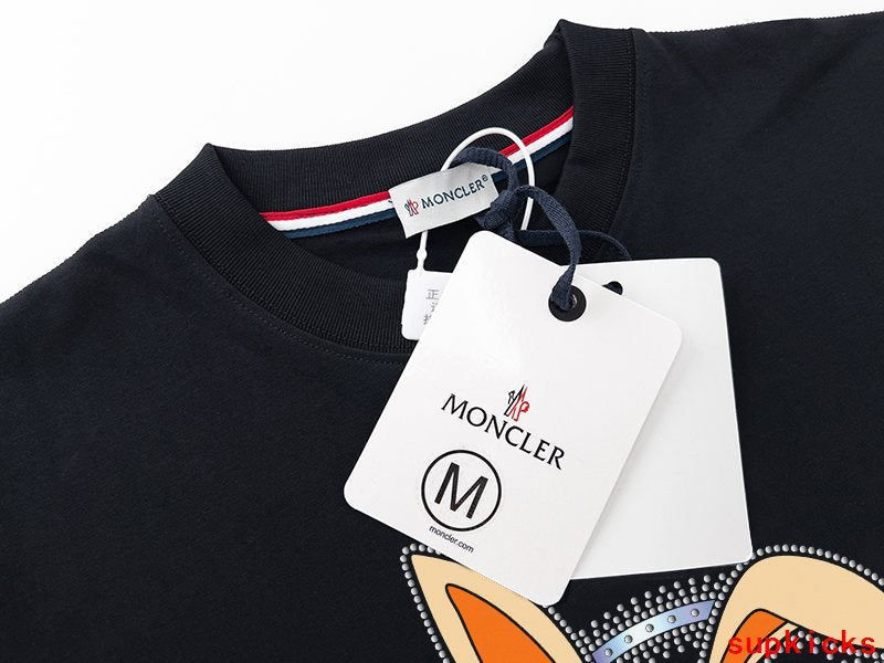 Flat lay presentation of Moncler luxury clothing with everyday silhouette