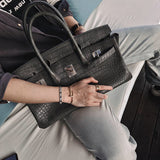 Side view of polished structured handbag