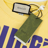 Full styled look of Gucci luxury clothing with signature branding