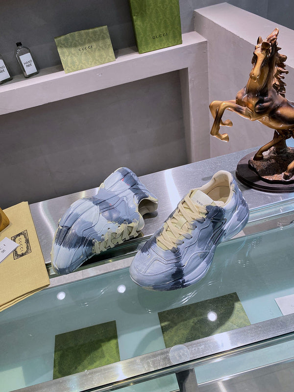 Gucci soft grey luxury sneakers view 5 bold athletic profile