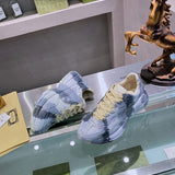 Gucci soft grey luxury sneakers view 5 bold athletic profile