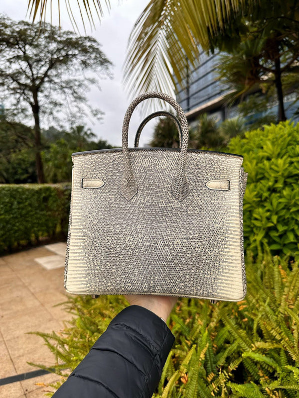 Side view of contemporary structured handbag