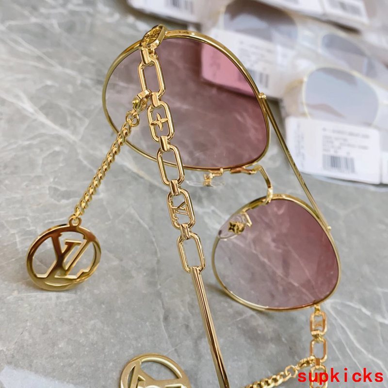 Close-up detail view of Louis Vuitton unisex sunglasses