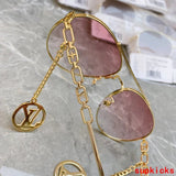 Close-up detail view of Louis Vuitton unisex sunglasses