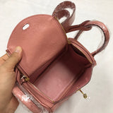 Close-up detail of curated bag design