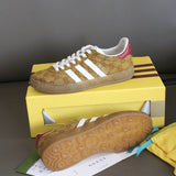 Side profile of Gucci stone beige sneakers padded collar comfort