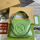 Front view of classic chic women's handbag – women's statement bag