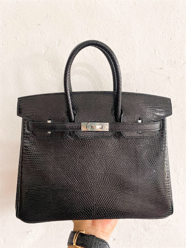 Side view of graceful structured handbag