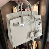  Signature satchel carried on shoulder 10