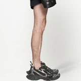 Close-up of Balenciaga sneakers hardware and fine stitching