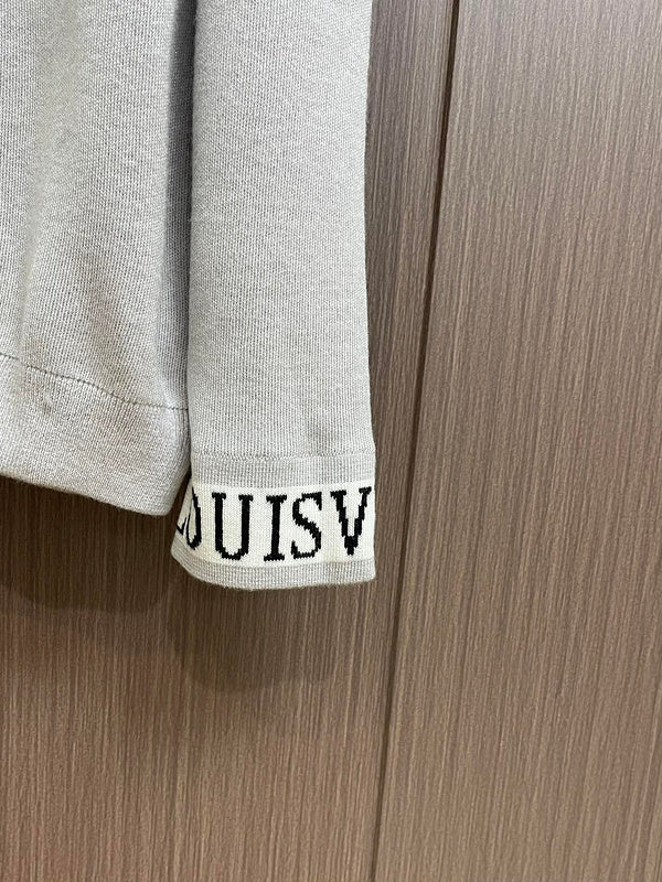 Back view of Louis Vuitton luxury clothing with signature branding