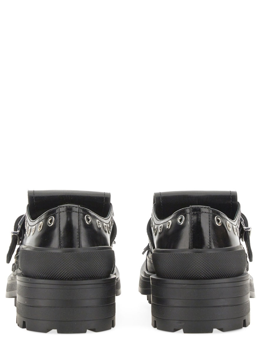 Alexander McQueen slides side profile designer luxury fashion