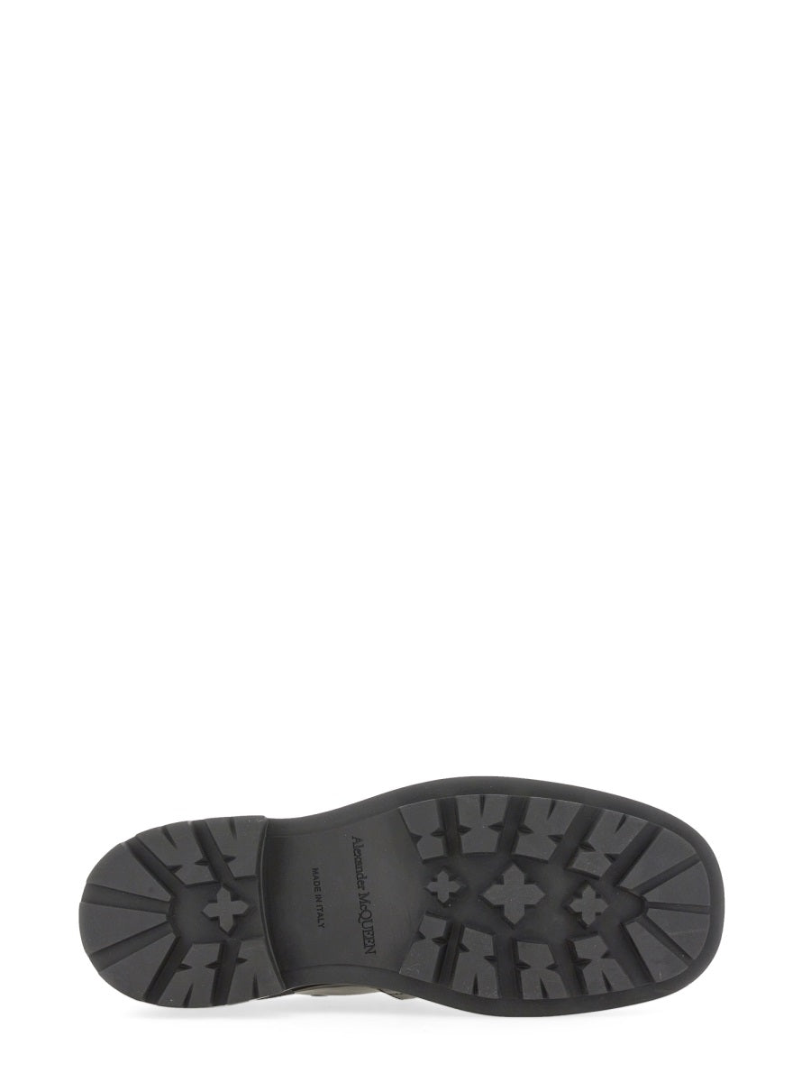 Alexander McQueen slides lifestyle shot premium designer piece